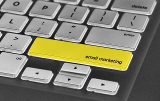 keyboard with the phrase email marketing highlighted